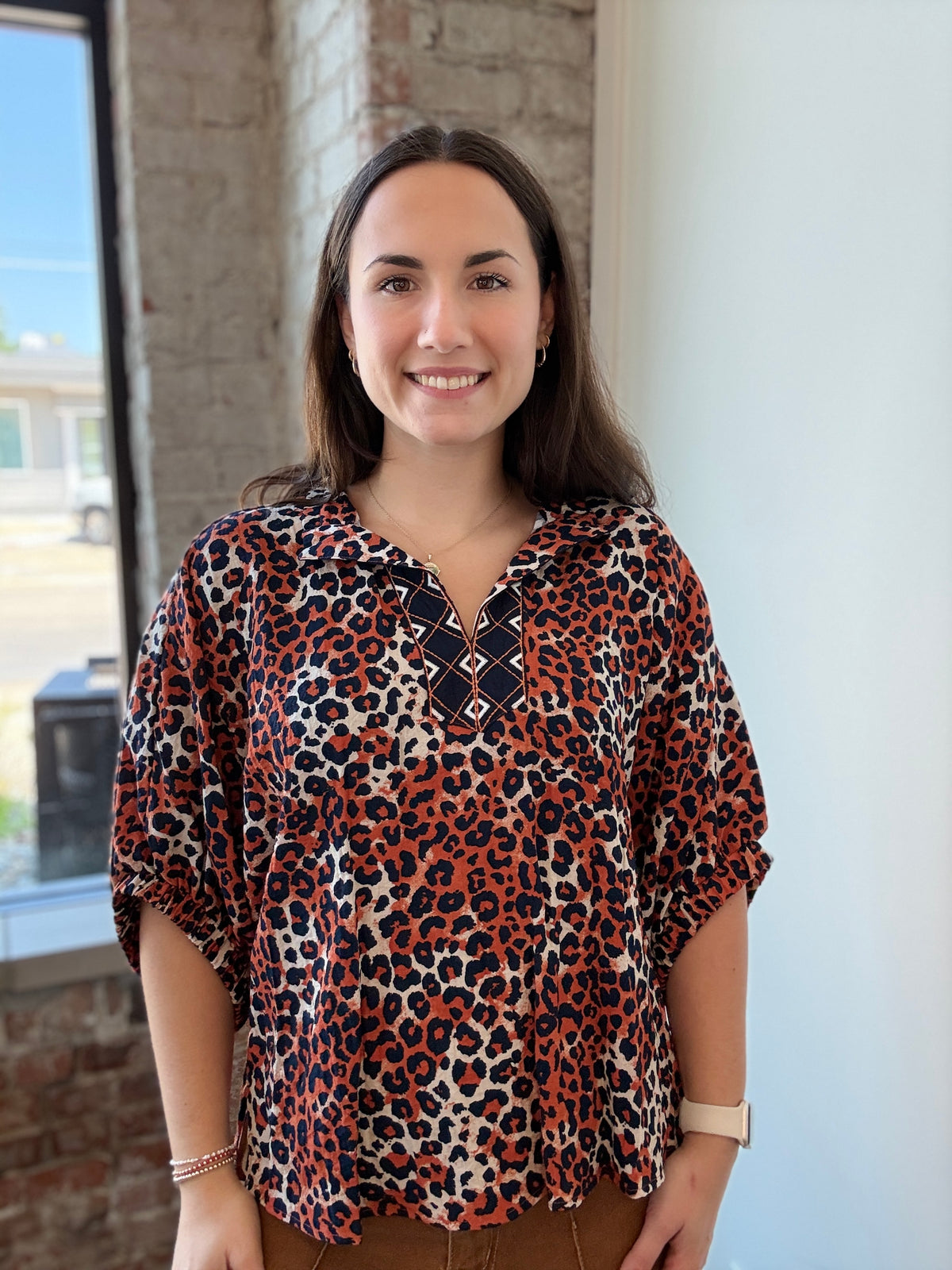 ORANGE AND ANIMAL PRINT BLOUSE
