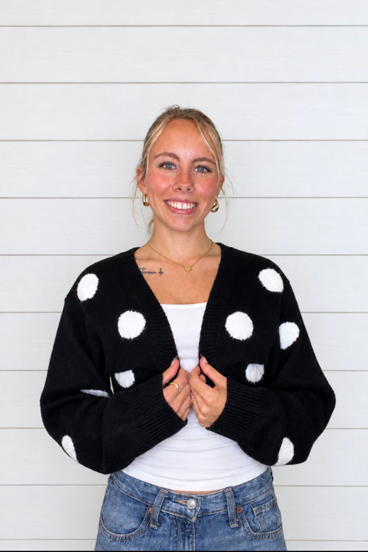 CASSIE’S BLACK POLKA DOT SWEATER