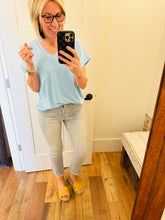 Load image into Gallery viewer, Mica Light Wash Step Hem Denim
